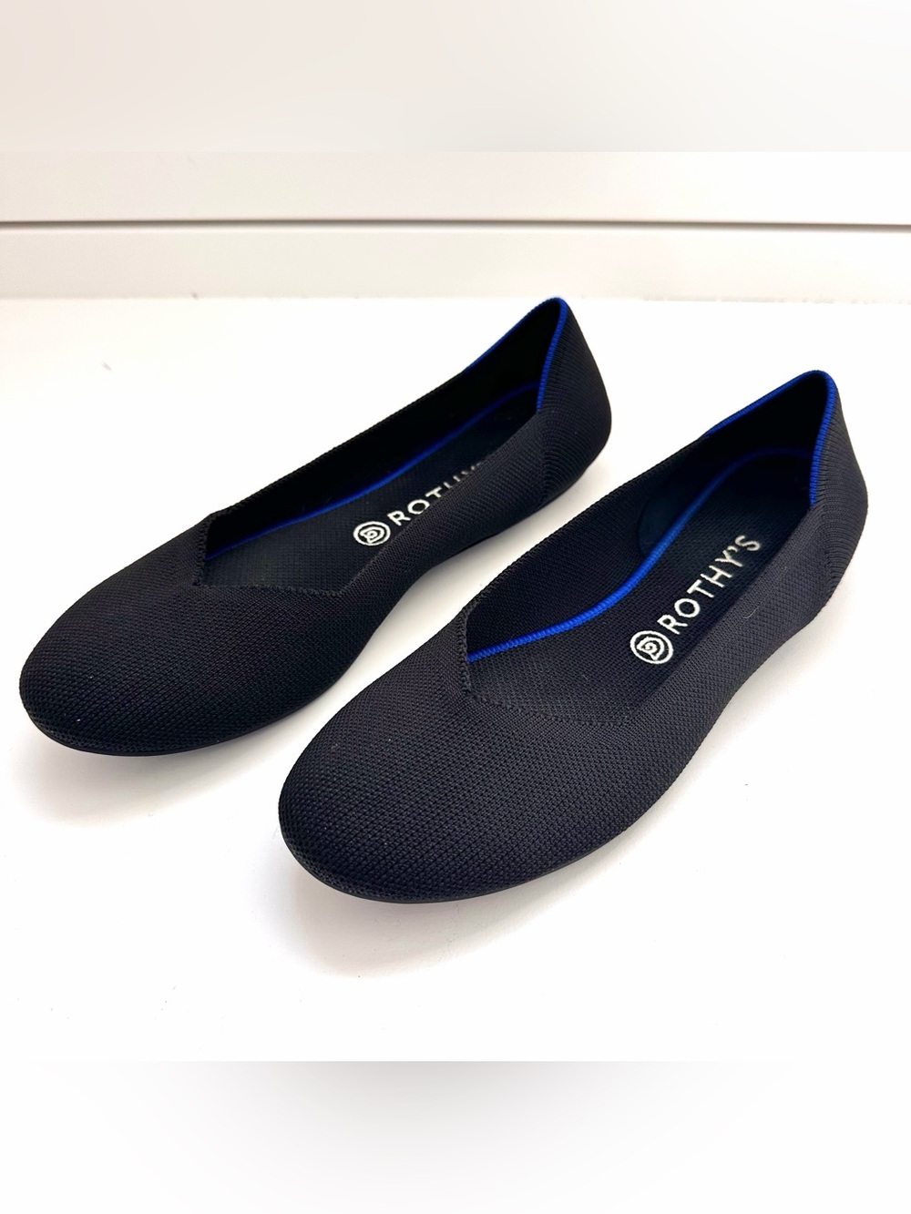 Rothy's Black Women's V-Neck Knit Flats with Blue Trim